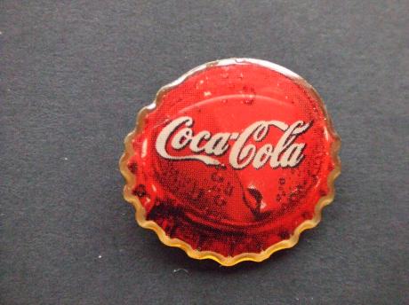 Coca Cola logo met waterdruppels